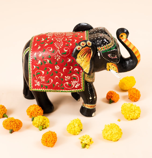 Regal March – Handcrafted Wooden Elephant Figurine Hover Image